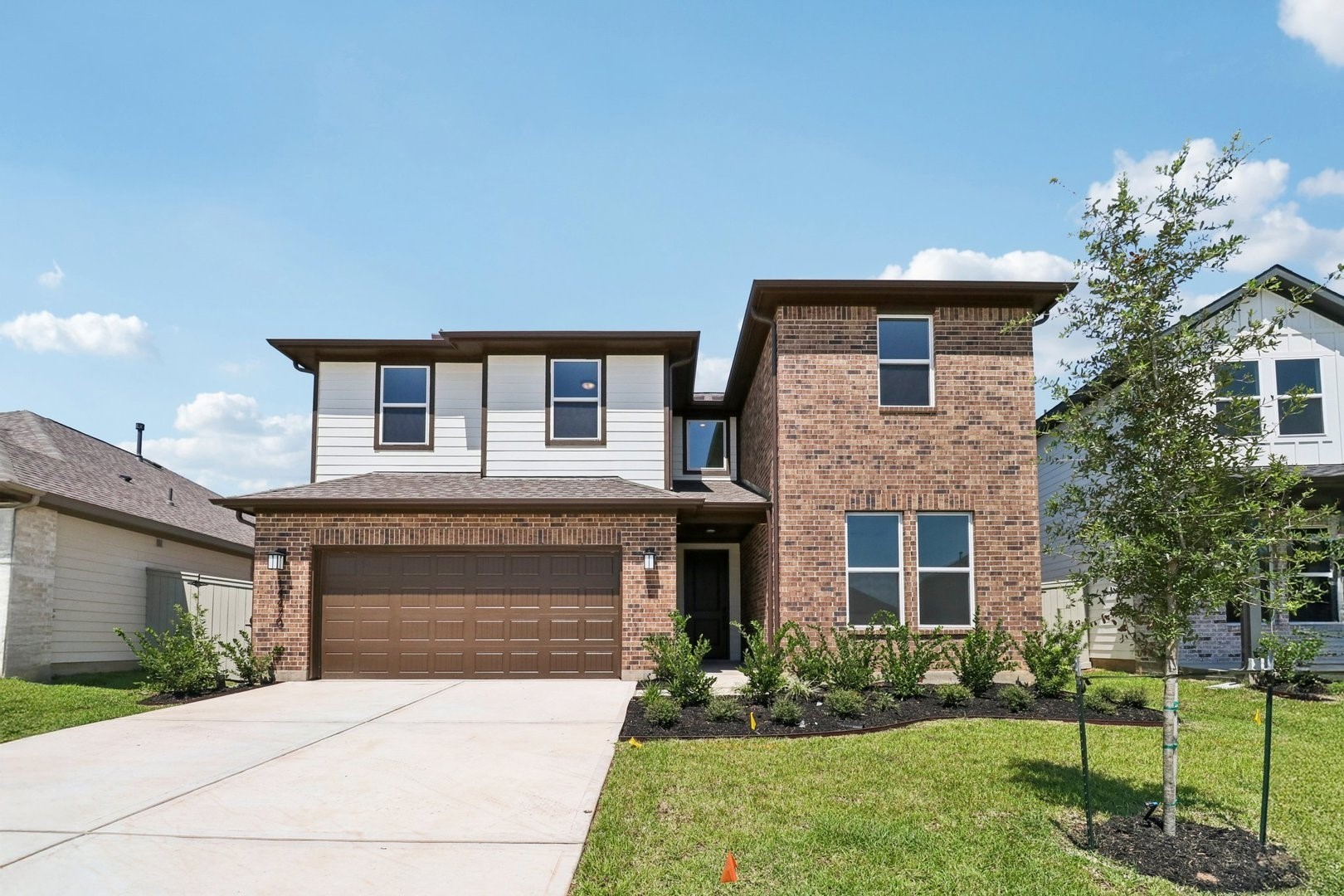 14470 Trumpet Lane Splendora, TX 77372 - Photo 1 of 27 a front view of a house with a garden