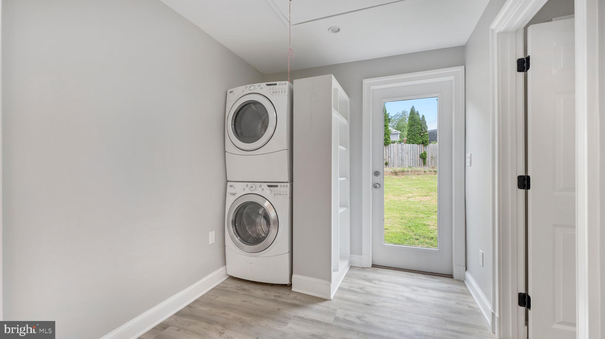 15705 Barnesville Road Boyds, MD 20841 - Photo 15 of 49 a utility room with dryer and washer