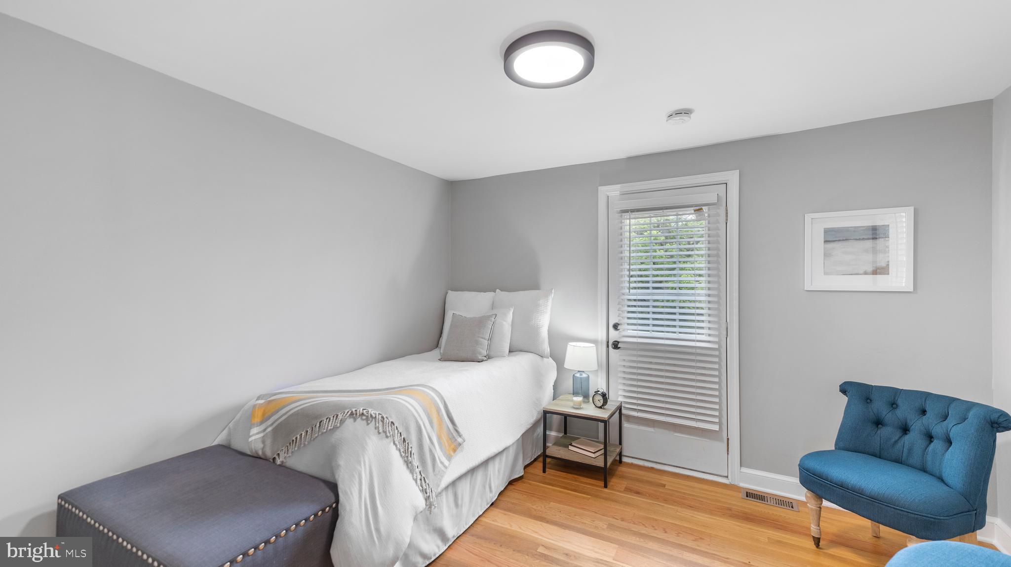 15705 Barnesville Road Boyds, MD 20841 - Photo 26 of 49 a bedroom with a bed and chair