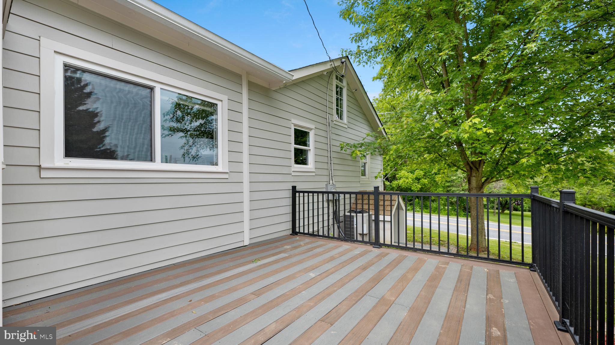 15705 Barnesville Road Boyds, MD 20841 - Photo 34 of 49 a view of a house with a balcony