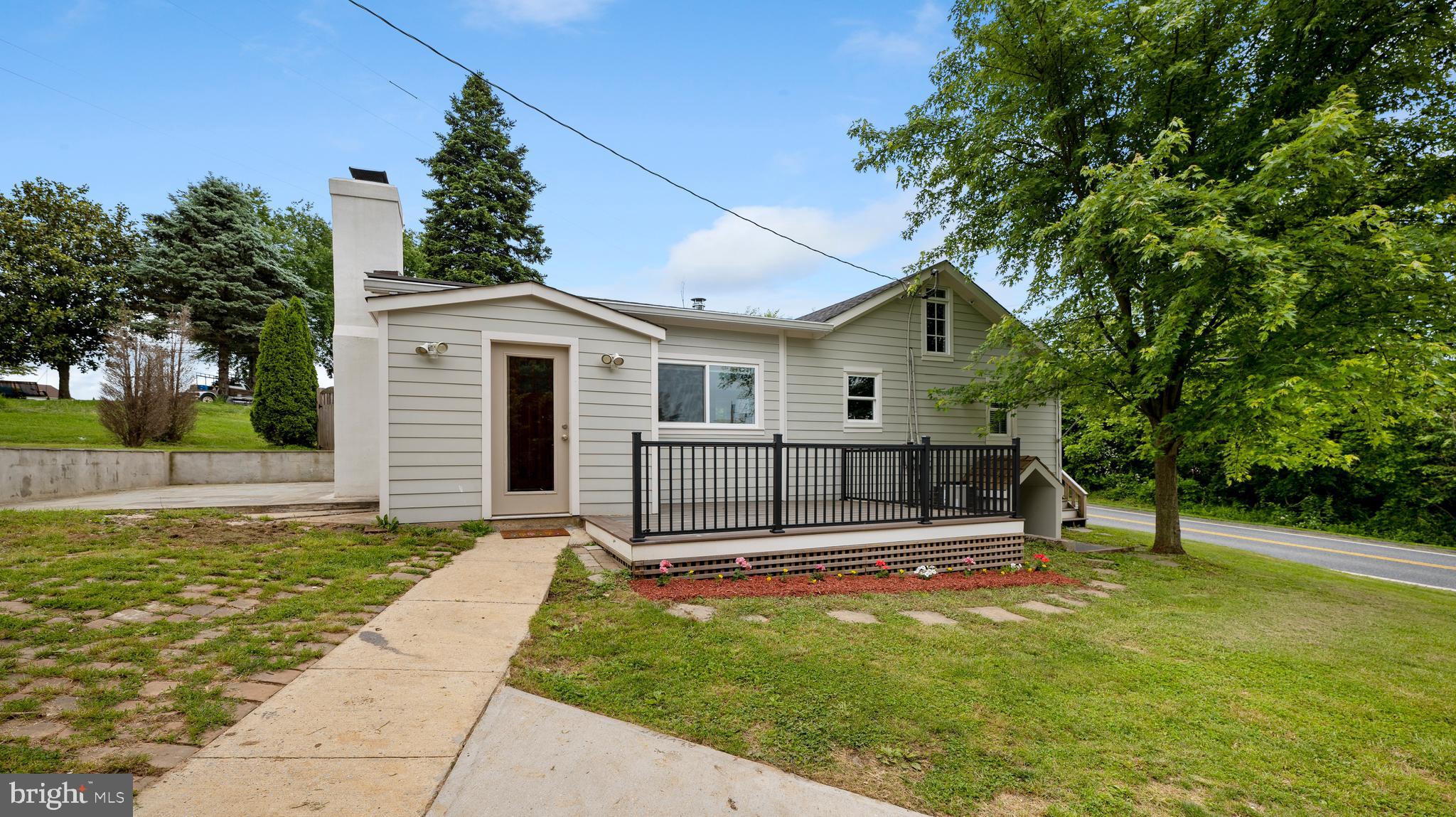 15705 Barnesville Road Boyds, MD 20841 - Photo 39 of 49 a front view of a house with a yard