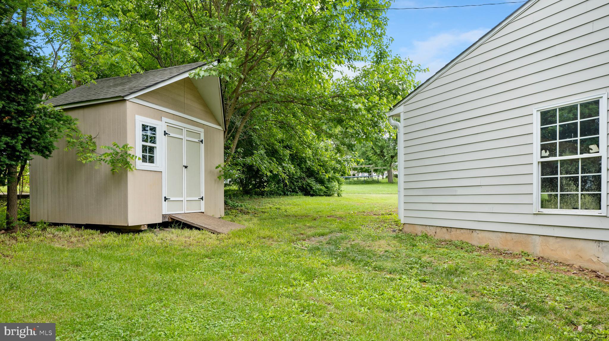 15705 Barnesville Road Boyds, MD 20841 - Photo 43 of 49 a view of a house with a yard