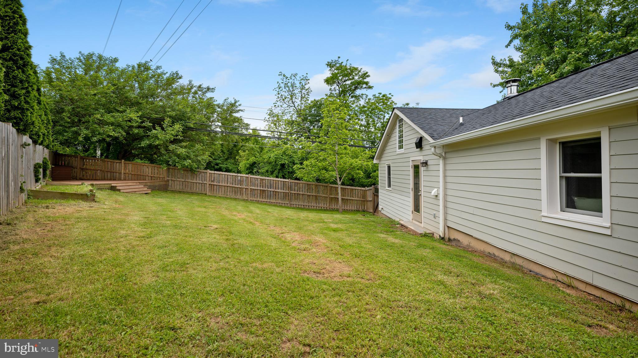 15705 Barnesville Road Boyds, MD 20841 - Photo 47 of 49 a view of a backyard with a small cabin