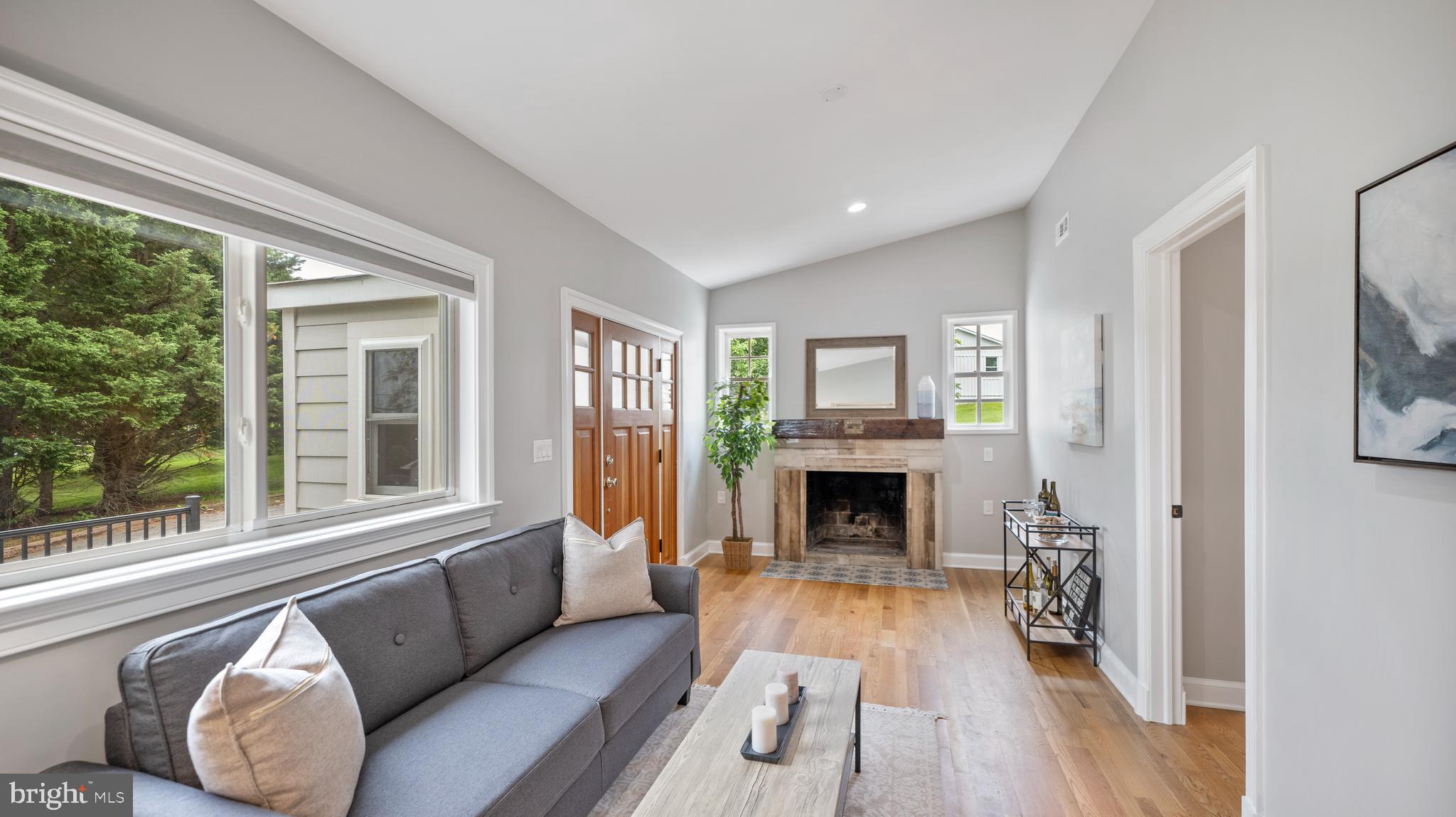 15705 Barnesville Road Boyds, MD 20841 - Photo 6 of 49 a living room with furniture and a fireplace