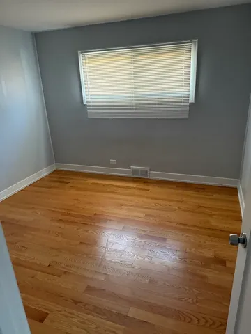 a kitchen with stainless steel appliances granite countertop a refrigerator a sink a stove a microwave and island