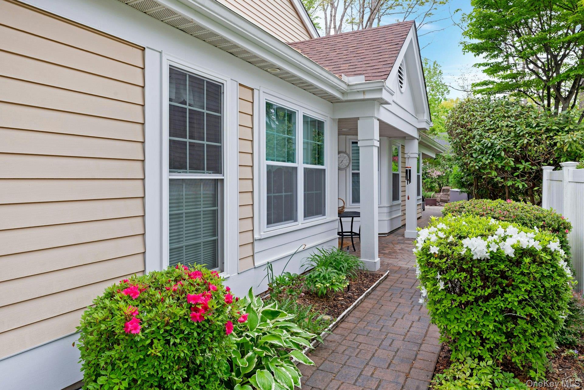 104 Glen Drive Ridge, NY 11961 - Photo 3 of 25 a view of a house with potted plants