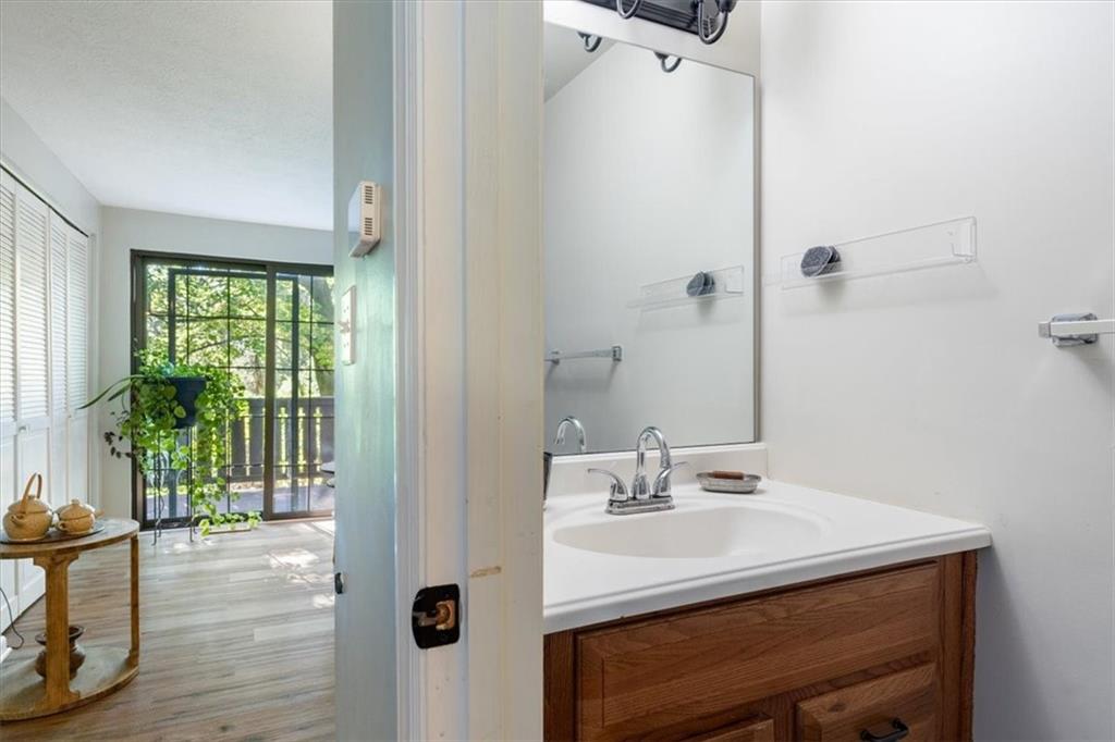 703 Timber Lane Sewickley, PA 15143 - Photo 18 of 30 a bathroom with a sink and a mirror