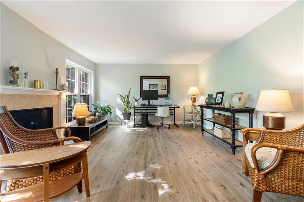 703 Timber Lane Sewickley, PA 15143 - Photo 5 of 30 a living room with furniture and a fireplace