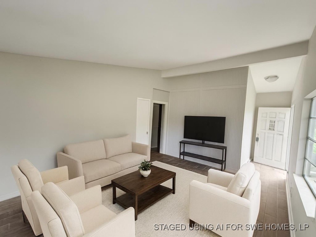 270 Triangle Drive Vidor, TX 77662 - Photo 13 of 29 a living room with furniture and a flat screen tv