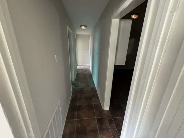 a view of hallway with stairs