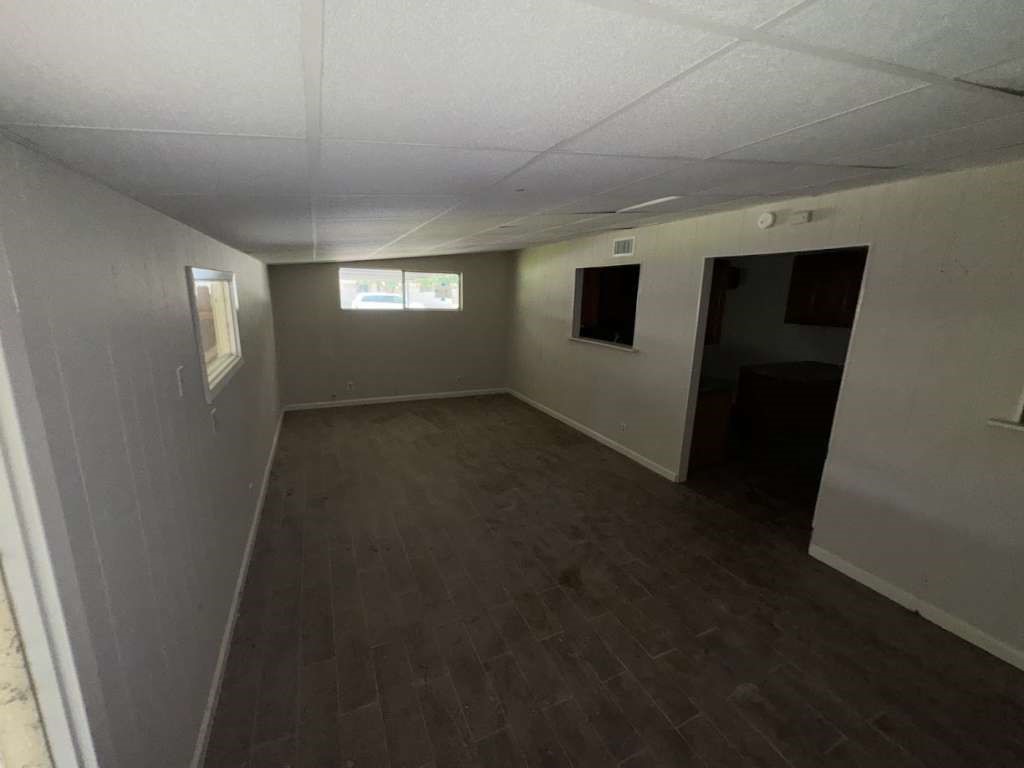 270 Triangle Drive Vidor, TX 77662 - Photo 19 of 27 an empty room with windows