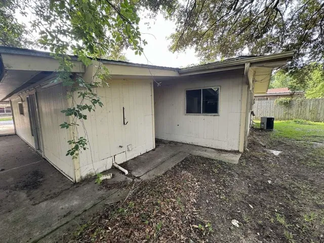 a house view with a backyard