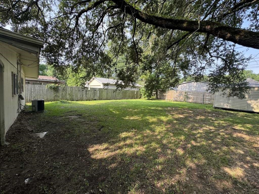 270 Triangle Drive Vidor, TX 77662 - Photo 7 of 27 a view of a trees with a yard