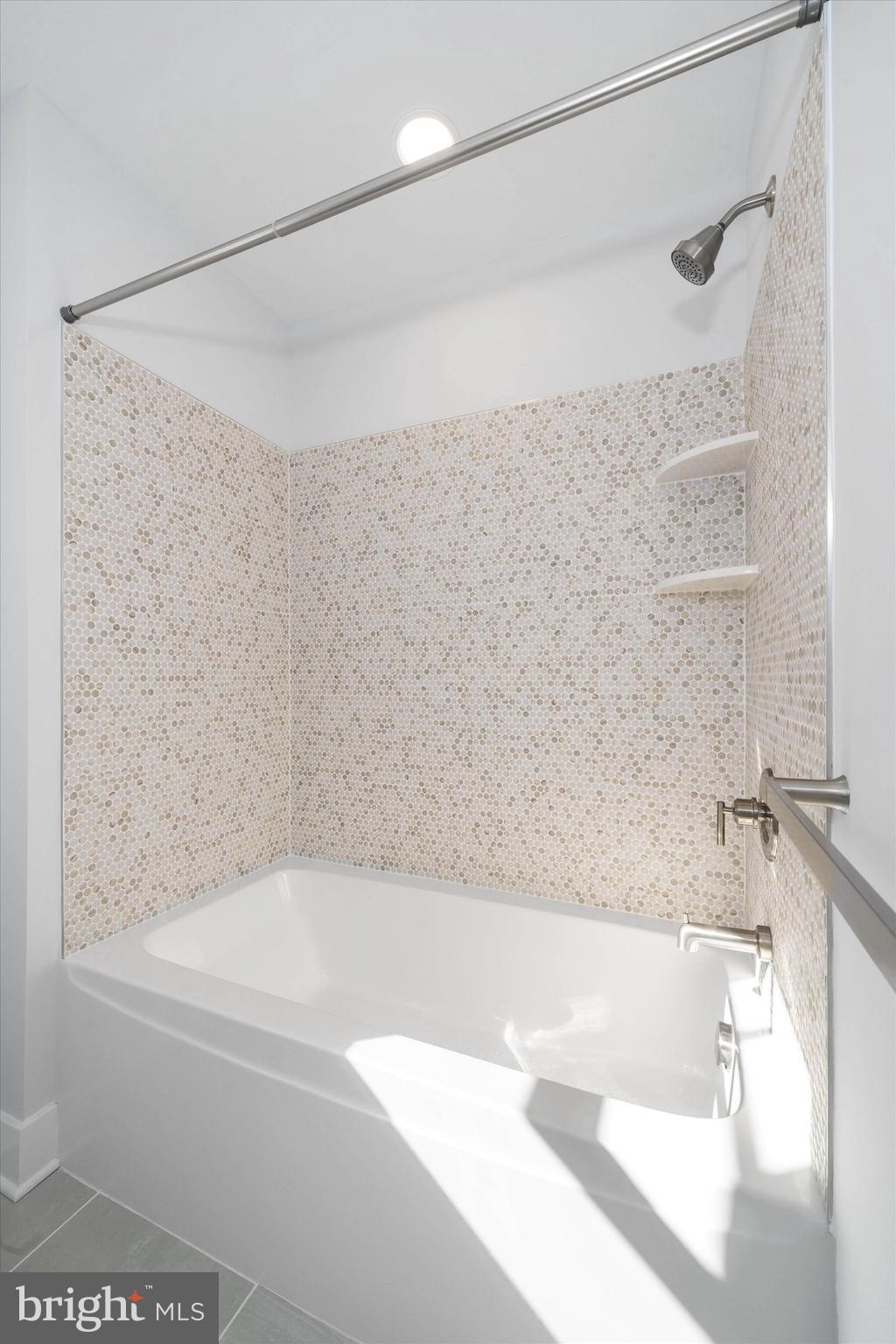 11809 River Run Lane Berlin, MD 21811 - Photo 46 of 95 a bathroom with a shower and a bath tub