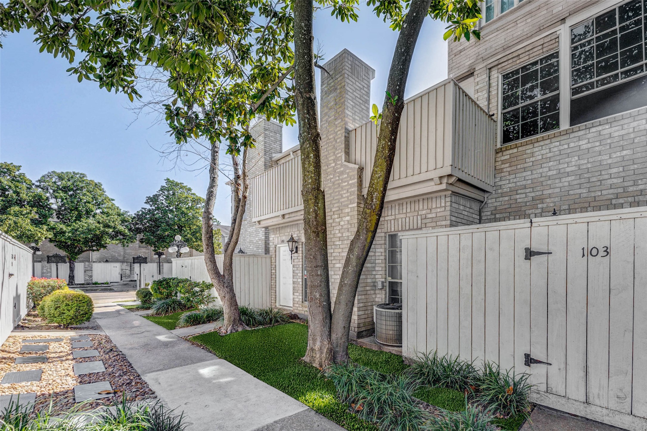 3800 Tanglewilde Street, Unit 102 Houston, TX 77063 - Photo 22 of 28 a view of a entrance gate of the house