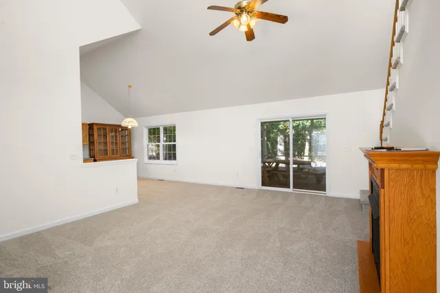 a kitchen with stainless steel appliances granite countertop a refrigerator sink and cabinets