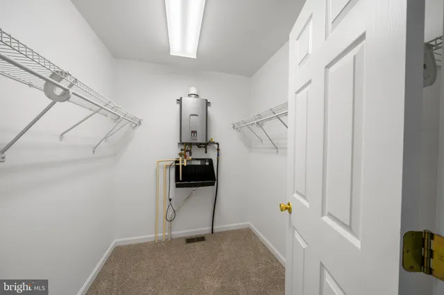 an empty room with a bathroom