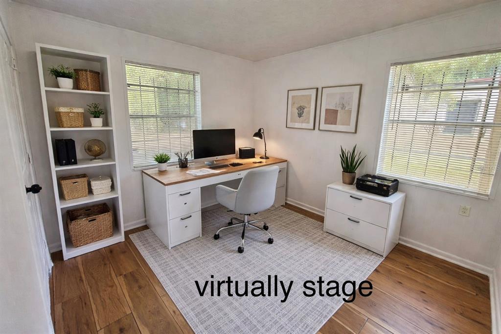 5551 Verbena Road Jacksonville, FL 32209 - Photo 11 of 13 a view of a workspace with furniture and a window