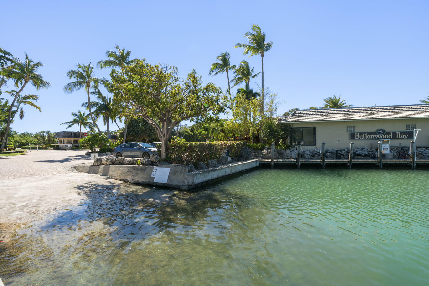 96000 Overseas Highway, Unit S3 AND 29' BOAT SLIP Key Largo, FL 33037 - Photo 24 of 38 a view of a house with a yard