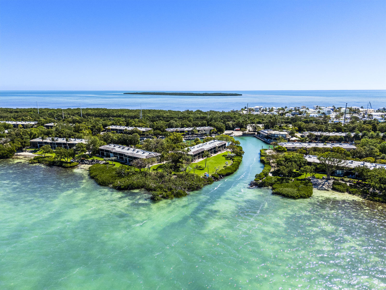96000 Overseas Highway, Unit S3 AND 29' BOAT SLIP Key Largo, FL 33037 - Photo 35 of 38 an aerial view of a house with a garden