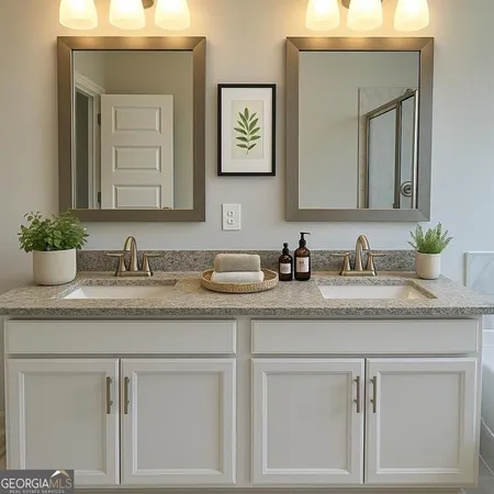 a bathroom with sink and mirror
