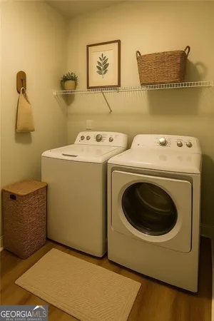 a utility room with dryer and washer