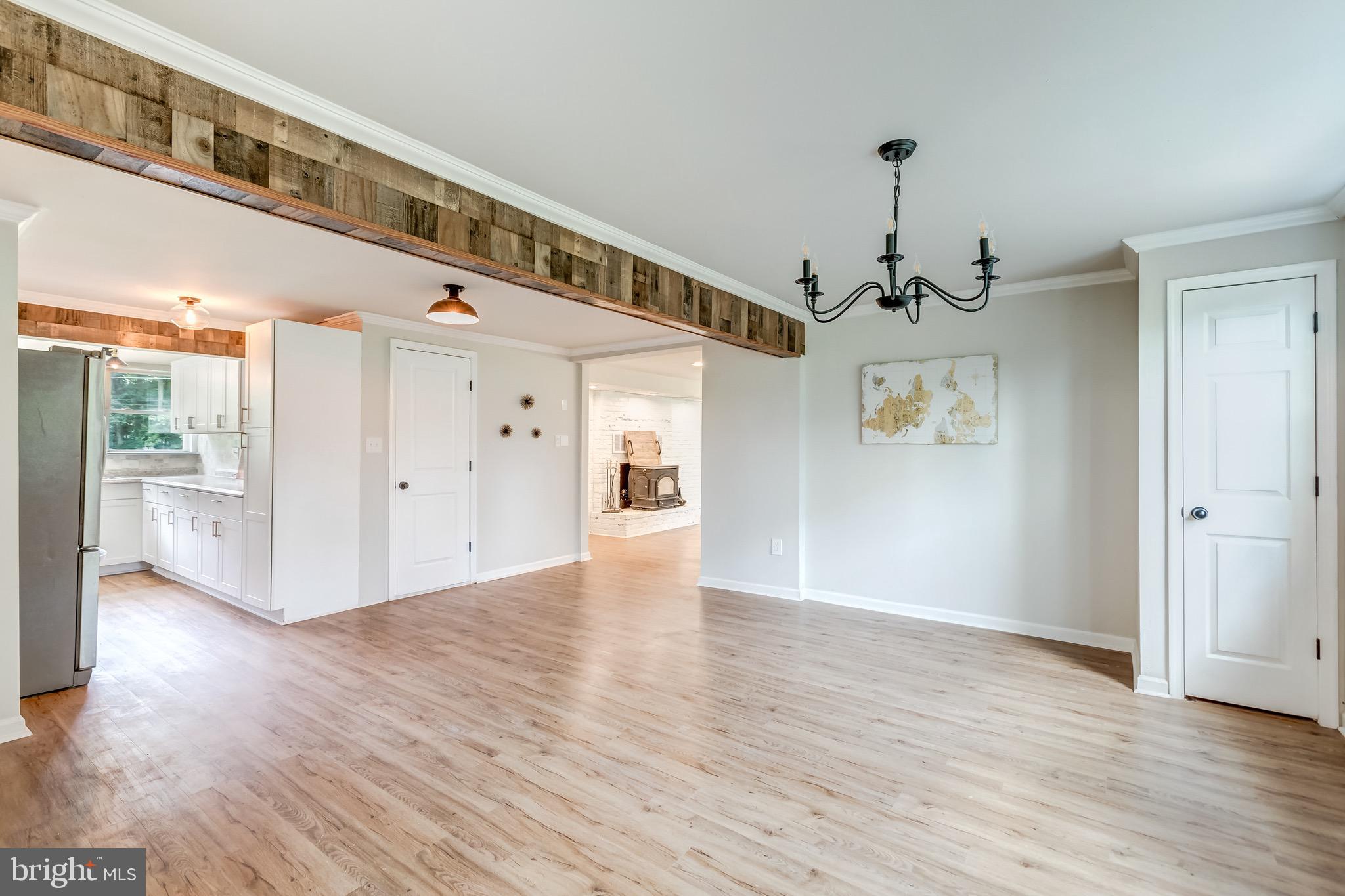 24436 Lenah Road Aldie, VA 20105 - Photo 14 of 39 a view of an empty room and wooden floor