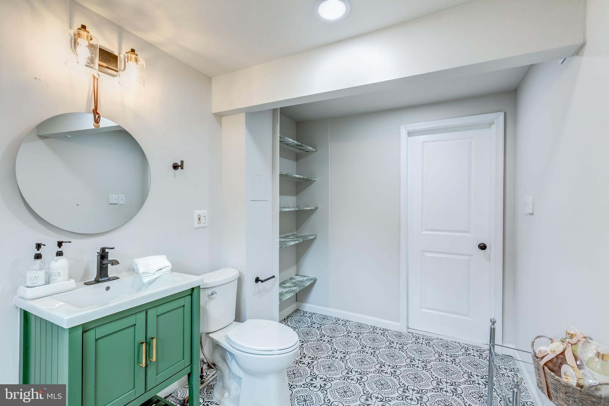 24436 Lenah Road Aldie, VA 20105 - Photo 24 of 39 a bathroom with a sink toilet and shower