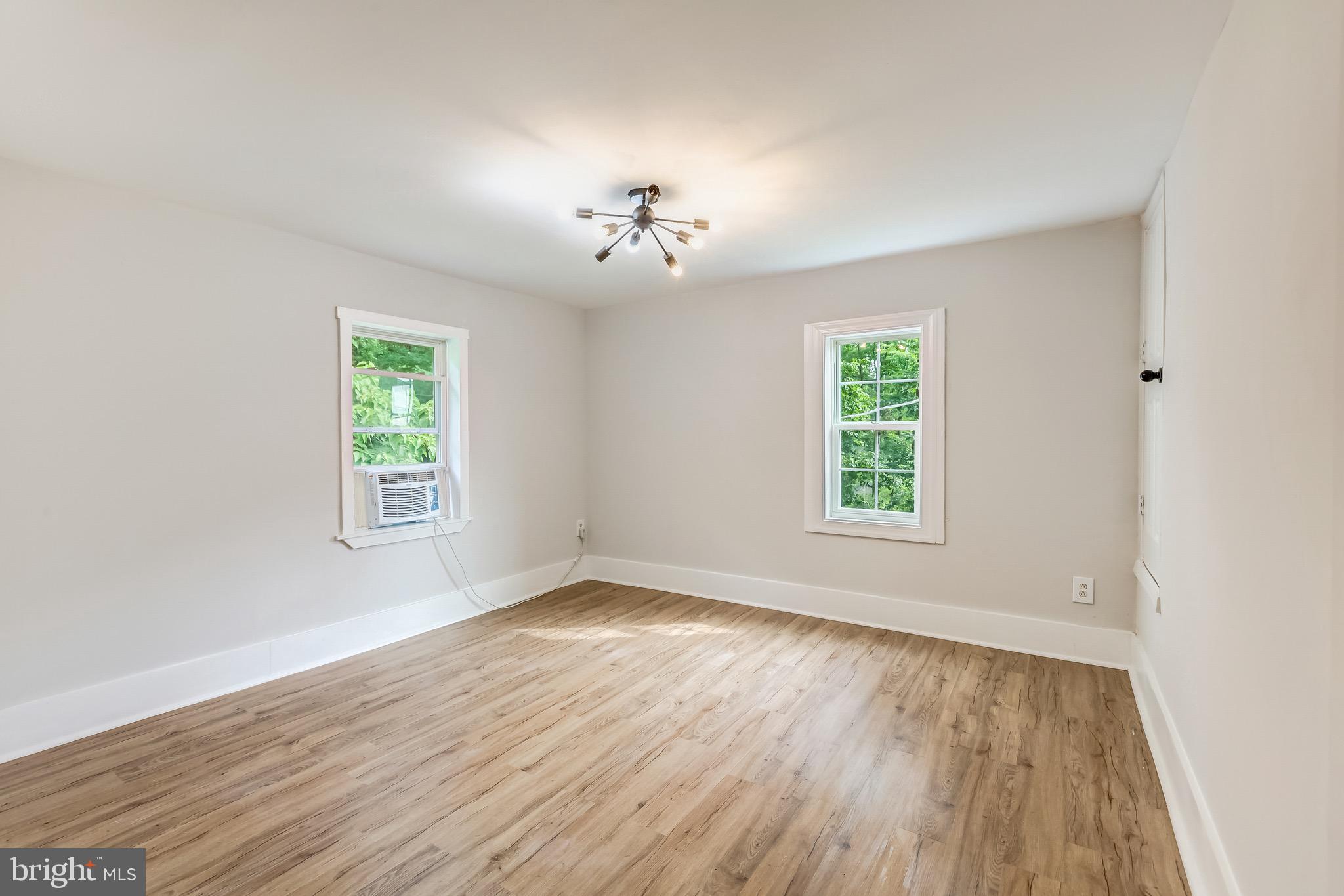 24436 Lenah Road Aldie, VA 20105 - Photo 27 of 39 wooden floor in an empty room with a window