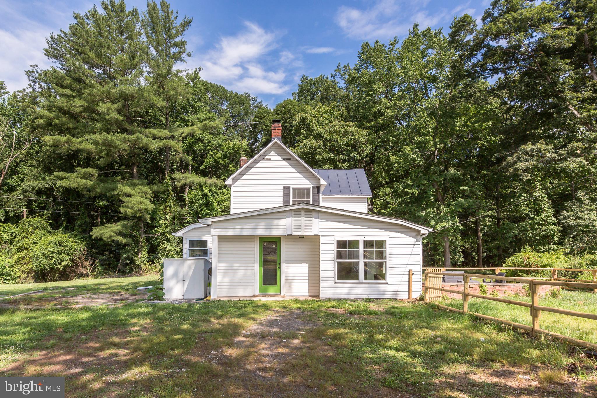 24436 Lenah Road Aldie, VA 20105 - Photo 38 of 39 a front view of a house with a yard