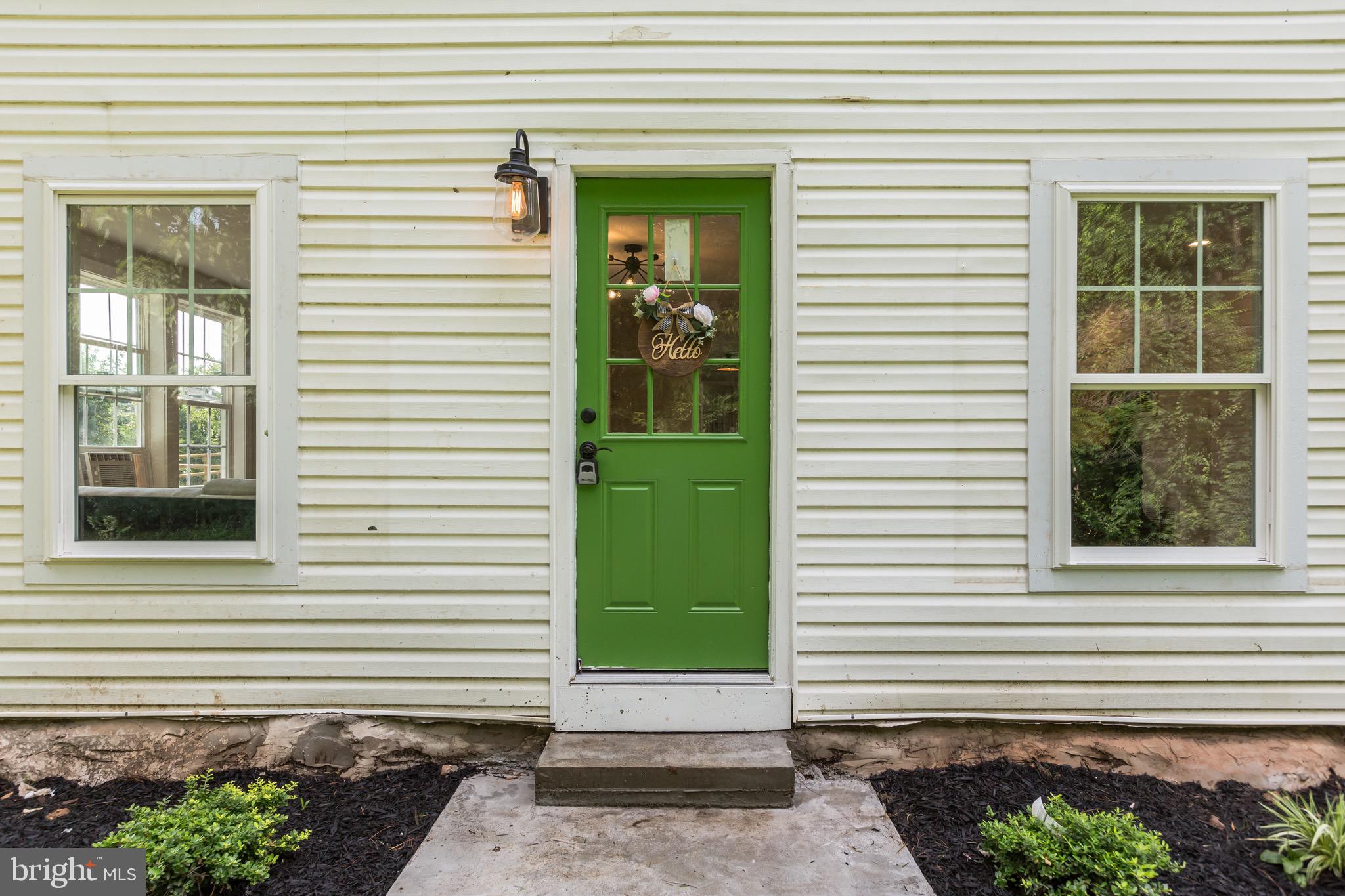 24436 Lenah Road Aldie, VA 20105 - Photo 4 of 39 a view of a house with a window and a door