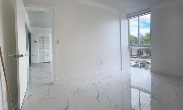 a bathroom with a sink a toilet a shower and a mirror