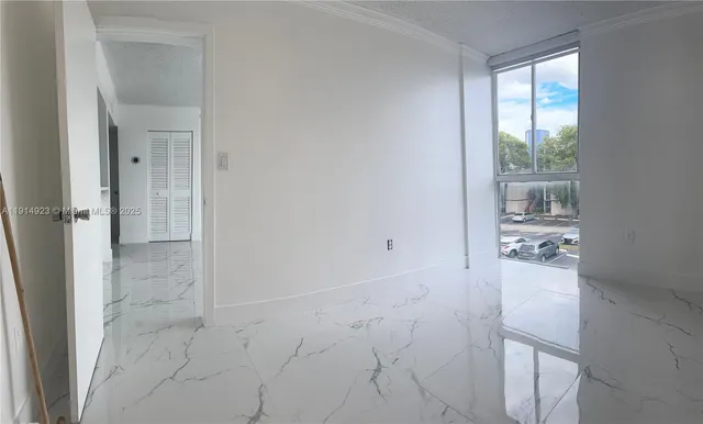 a bathroom with a sink a toilet a shower and a mirror