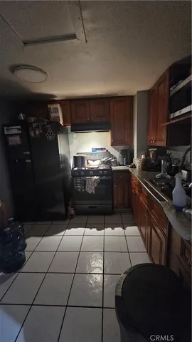 a bed sitting in a room next to a window