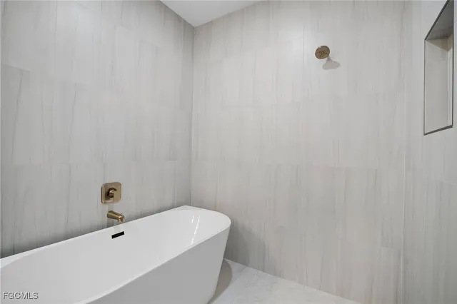 a bathroom with a bathtub