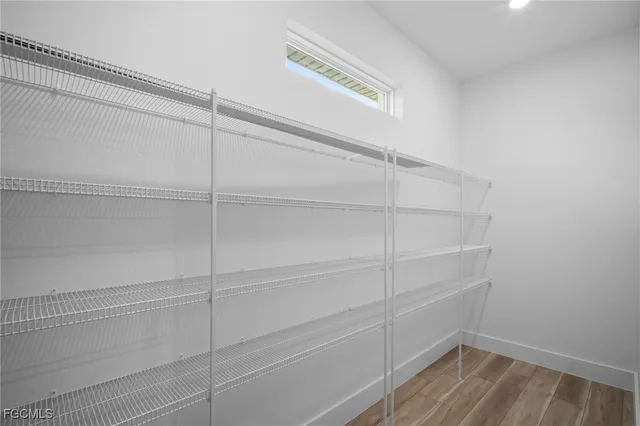 a view of a room with racks on the wall