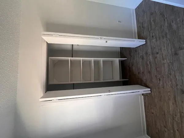 a view of entryway with wooden floor