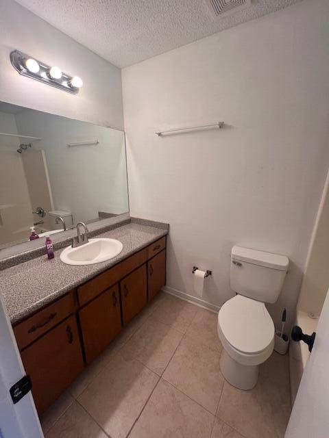 1925 Esplanade Street Navarre, FL 32566 - Photo 18 of 22 a bathroom with a sink vanity mirror and toilet