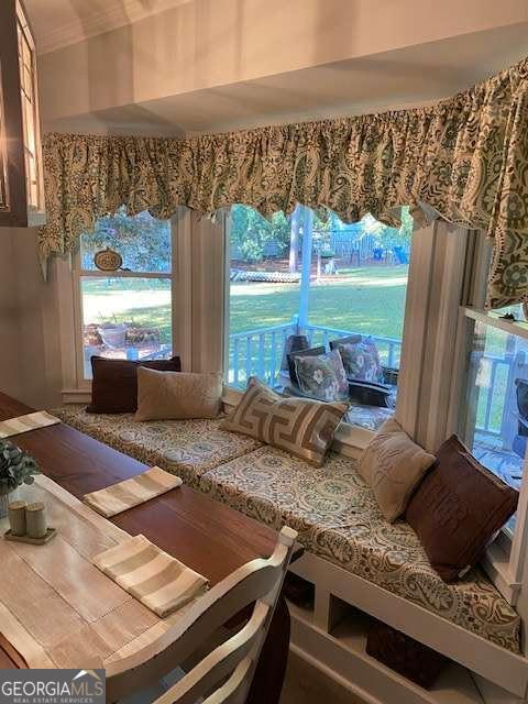 2008 Rutland Road, Unit 10 Tifton, GA 31793 - Photo 13 of 32 a view of a living room and floor to ceiling window or hardwood