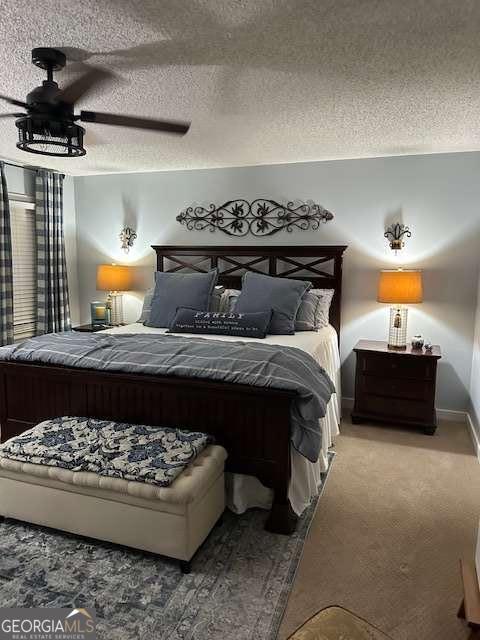 2008 Rutland Road, Unit 10 Tifton, GA 31793 - Photo 22 of 32 a bed sitting in a bedroom next to a lamp