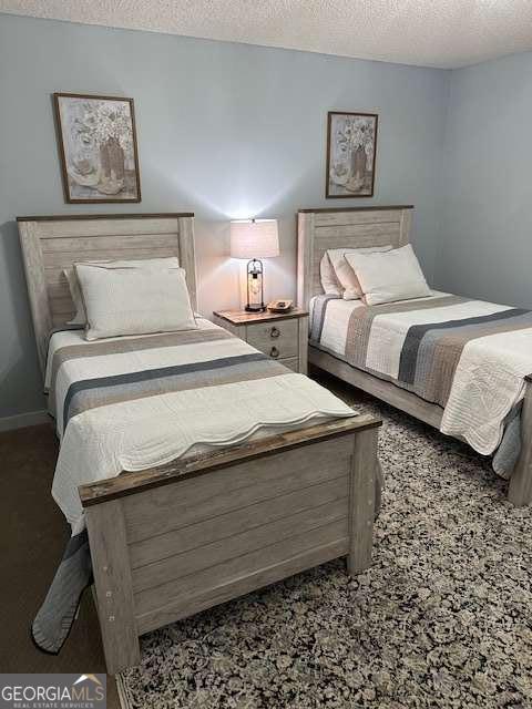 2008 Rutland Road, Unit 10 Tifton, GA 31793 - Photo 31 of 32 a bedroom with bed and cupboard