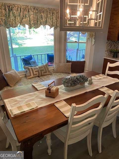 2008 Rutland Road, Unit 10 Tifton, GA 31793 - Photo 10 of 32 a view of a dining room with furniture window and outside view