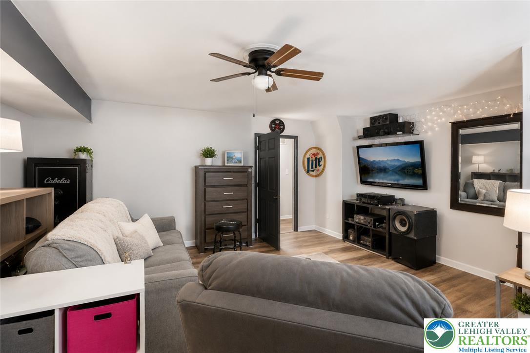 2649 Nottingham Road Bethlehem, PA 18017 - Photo 28 of 49 Relax in this inviting living space, complete with durable flooring and a ceiling fan for year-round comfort.