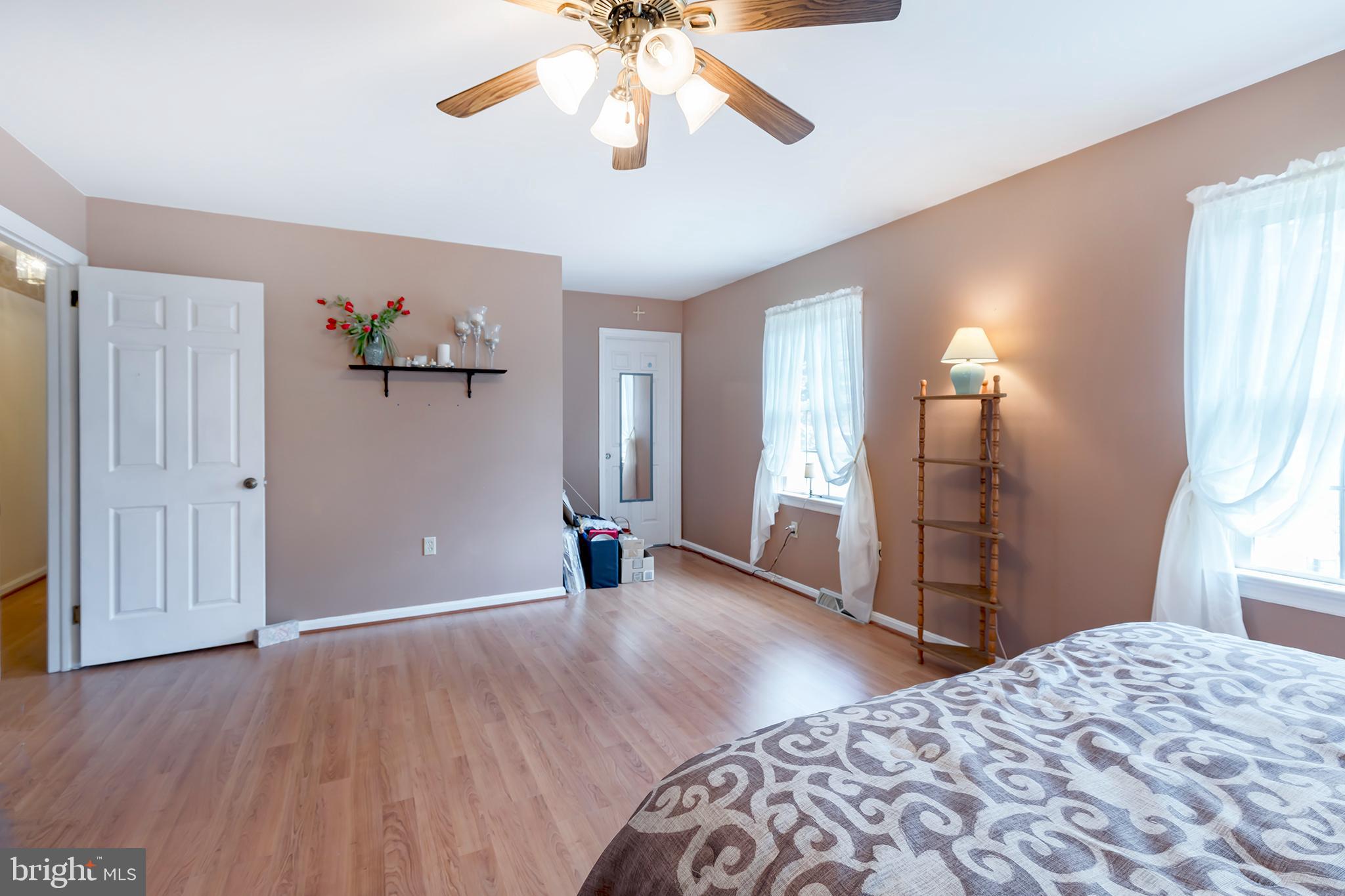 1350 Park Road Lancaster, PA 17601 - Photo 22 of 40 a bedroom with a bed and a chandelier