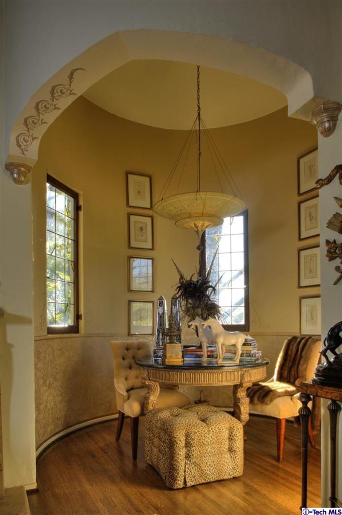 Undisclosed Address San Marino, CA 91108 - Photo 16 of 58 a living room with fireplace furniture and a table