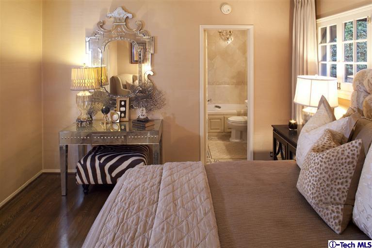 Undisclosed Address San Marino, CA 91108 - Photo 27 of 58 a bedroom with a bed and wooden floor