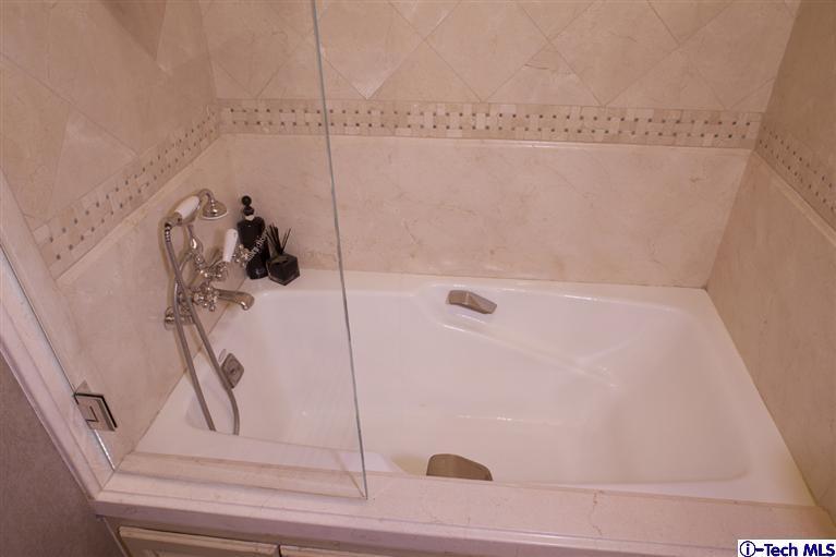 Undisclosed Address San Marino, CA 91108 - Photo 29 of 58 a bathroom with a bathtub