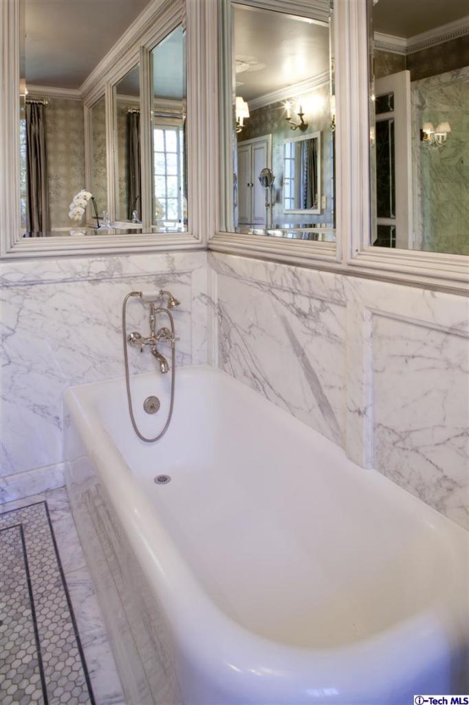 Undisclosed Address San Marino, CA 91108 - Photo 39 of 58 a view of a bathroom with sink and mirror