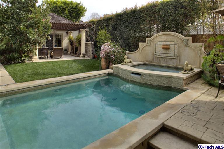 Undisclosed Address San Marino, CA 91108 - Photo 5 of 58 a front view of a house with garden