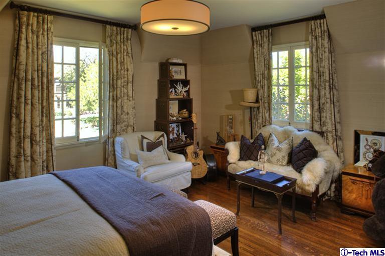 Undisclosed Address San Marino, CA 91108 - Photo 47 of 58 a bedroom with a bed and wooden floor